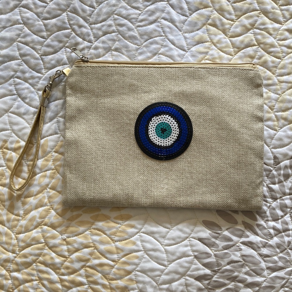 🧿 New. Beige clutch Hand bag with gold strap never used. Bought in Greece.